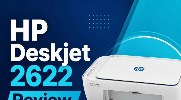 HP Deskjet 2622 Printer Review A compact white inkjet printer on a small home-office desk with a laptop beside it, soft natural window light